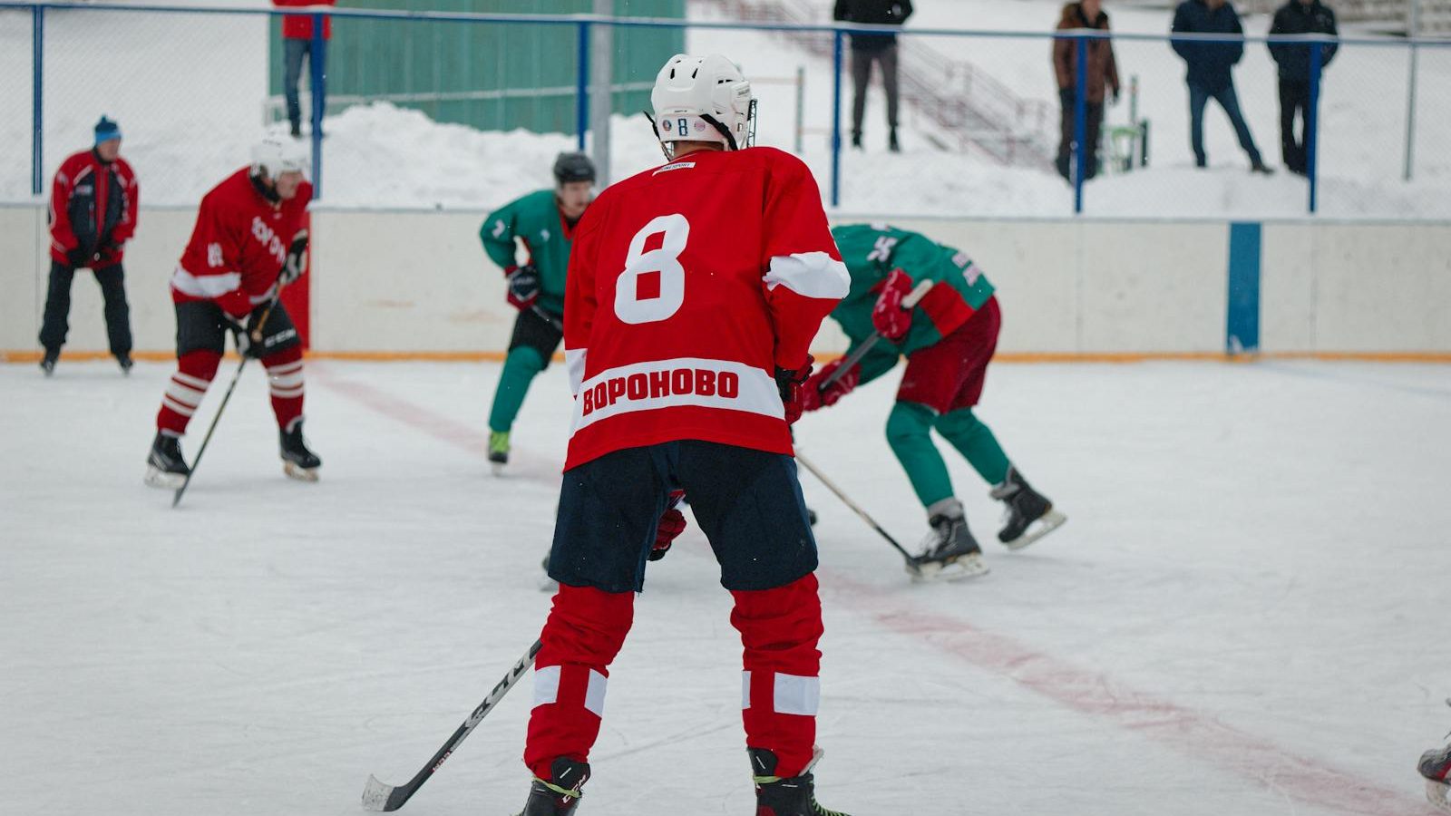 Ice hockey players in action on the rink