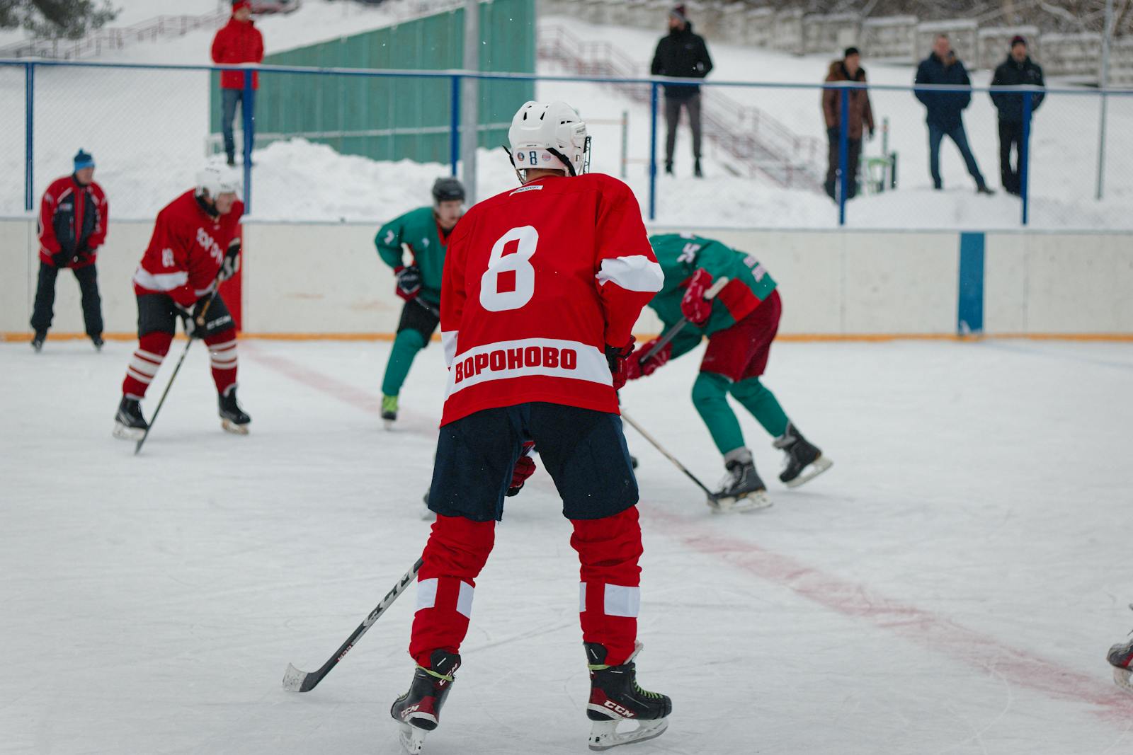 Ice hockey players in action on the rink