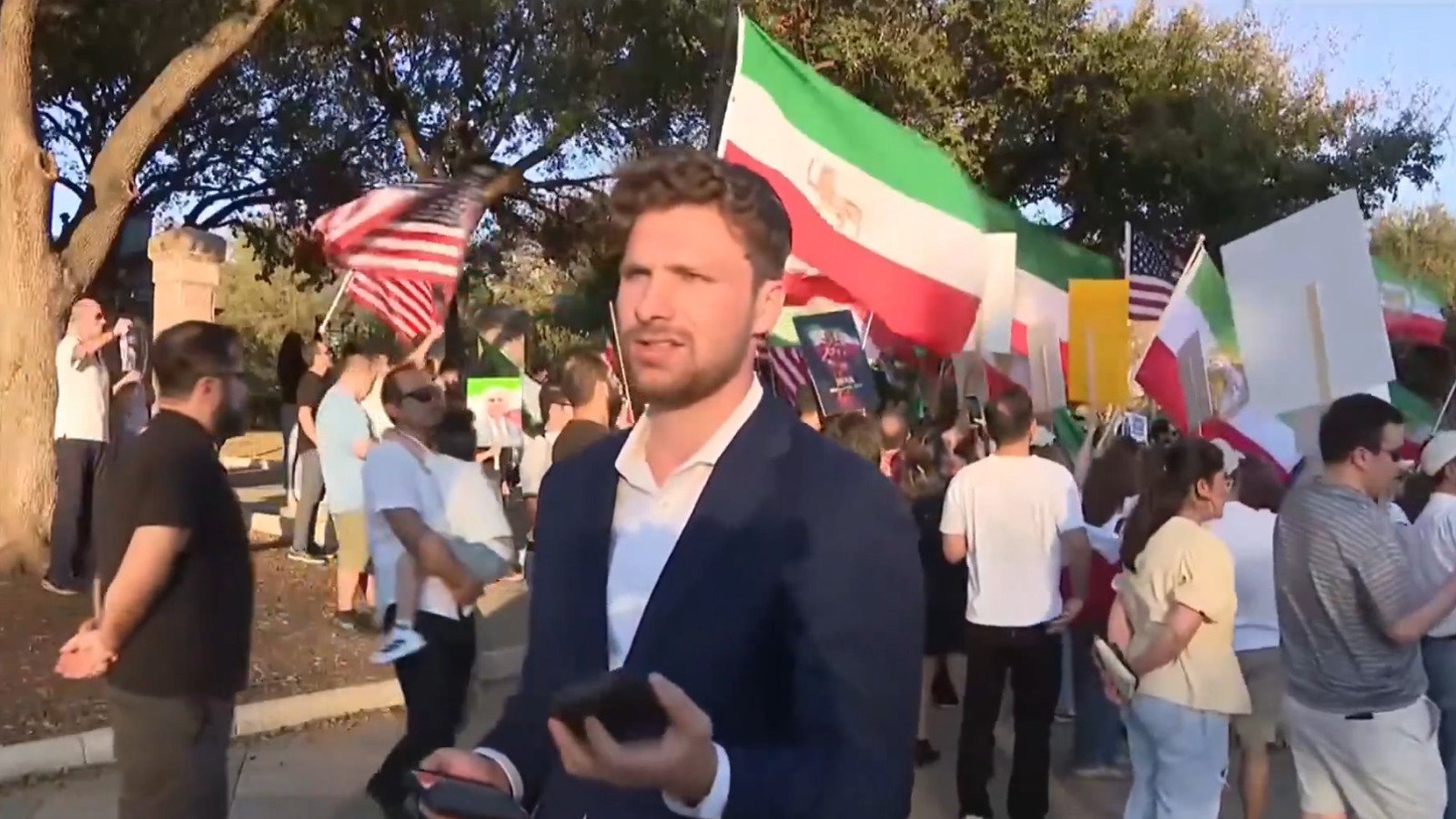 CBS Reporter Defies Orders Not Focus Crowd Celebrating Trump's Actions Iran