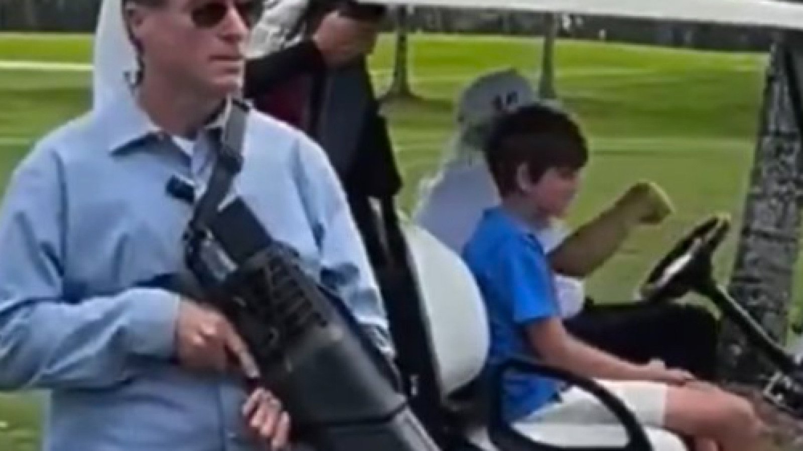 Secret Service detail holding suspected anti-drone weapon near President Trump