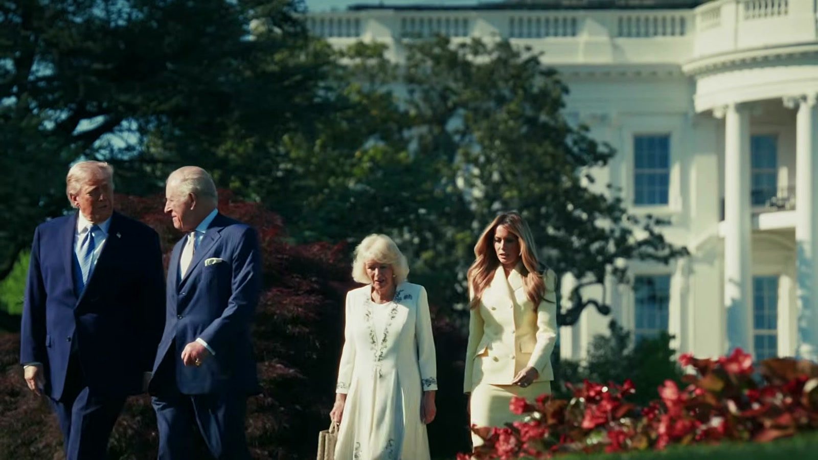 President Trump and King Charles walking near the White House beehive with Queen Camilla and First Lady Melania Trump.