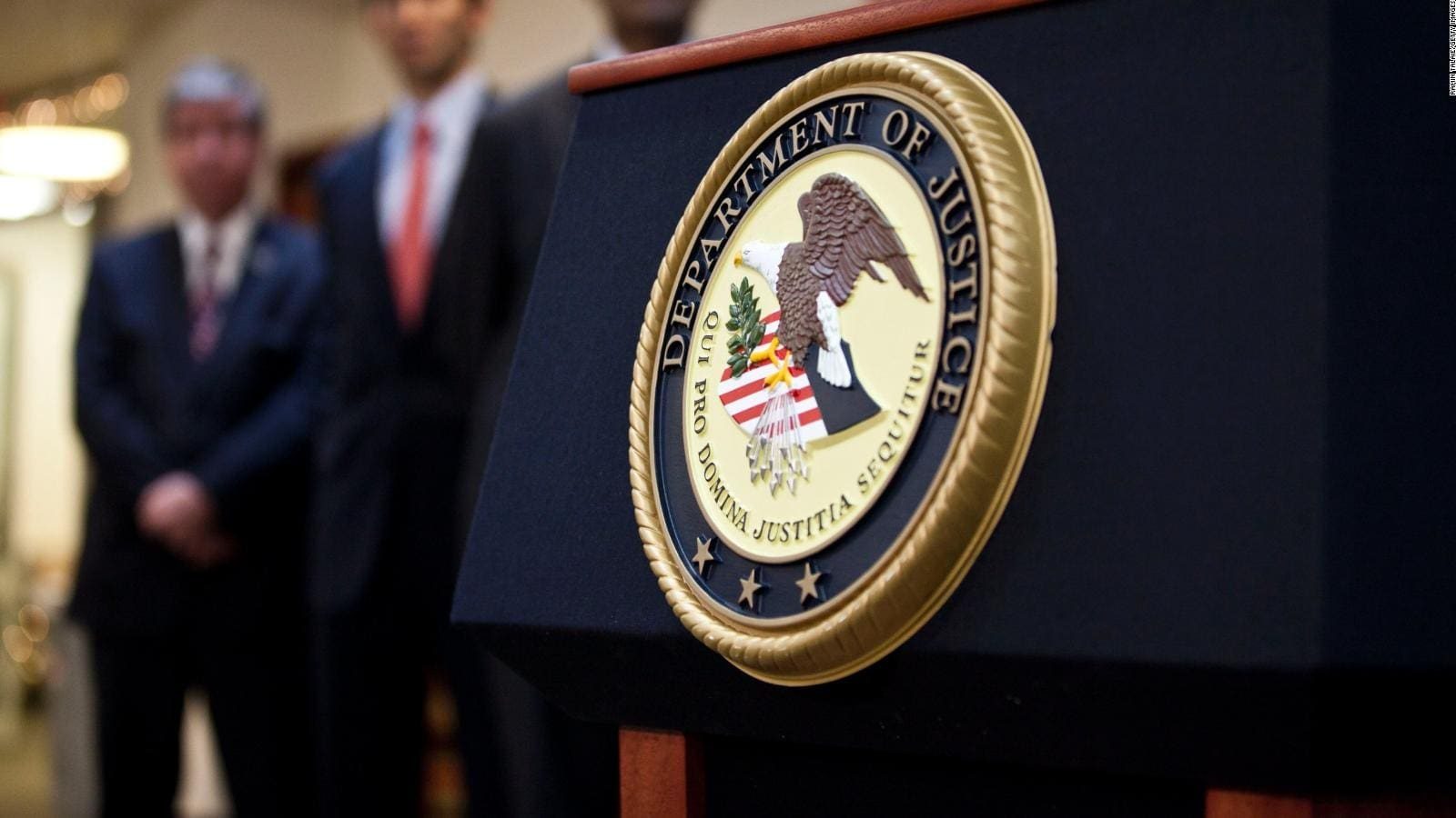 Justice Department podium seal during federal law enforcement announcement