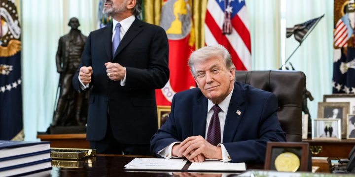 President Trump signs an executive order limiting mail-in voting in the Oval Office
