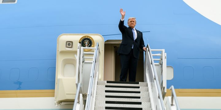 President Donald Trump boards Air Force One in China