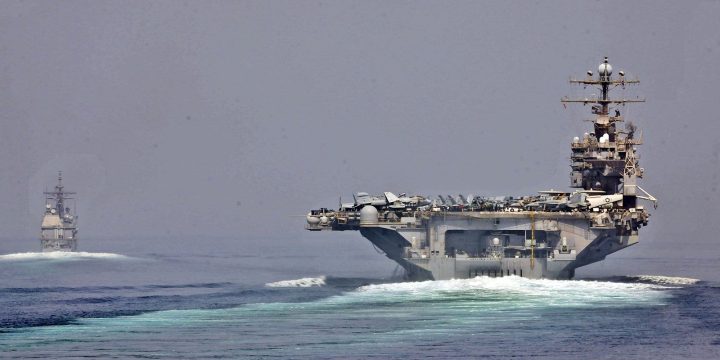 U.S. Navy ships transit near the Strait of Hormuz