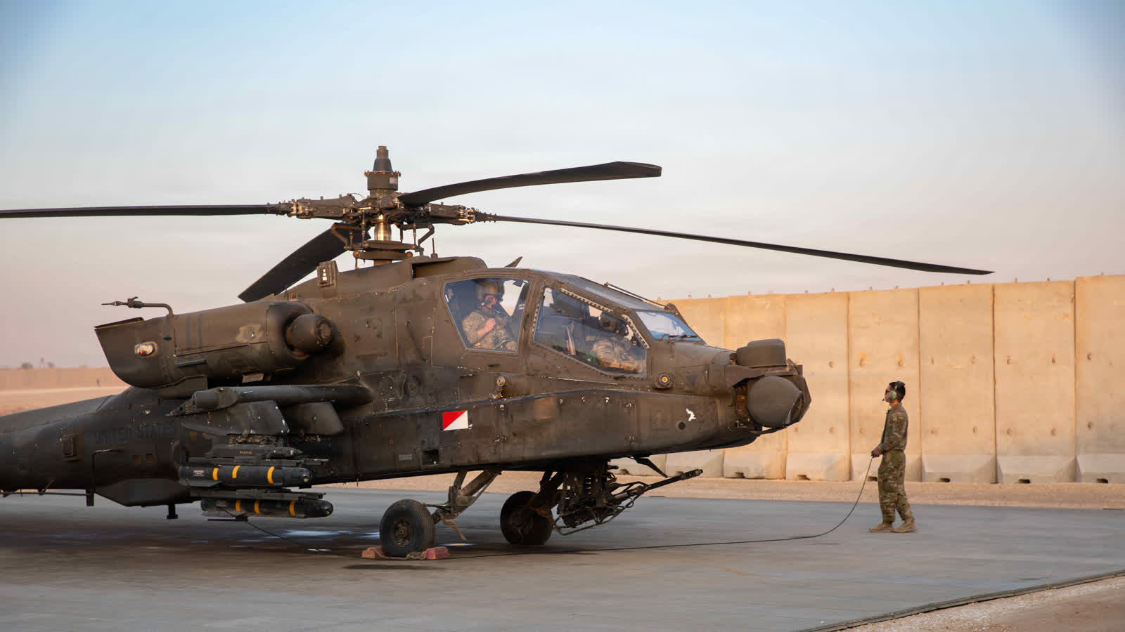 Official public domain rights-free U.S. Army photo of an AH-64 Apache helicopter in the CENTCOM area of responsibility