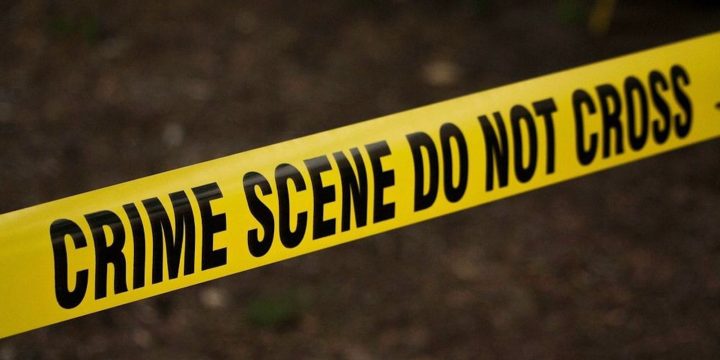 Crime scene tape at a police investigation scene