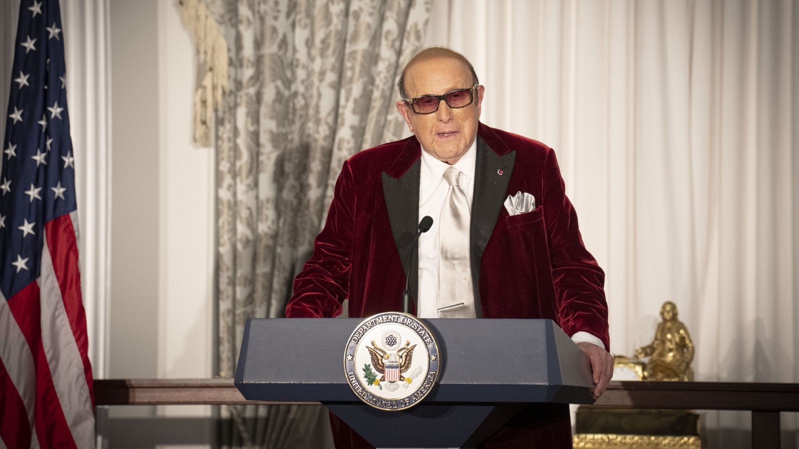 Clive Davis speaks at a Kennedy Center Honors Dinner at the State Department