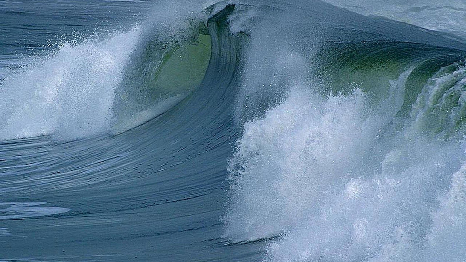 Large ocean waves breaking near shore