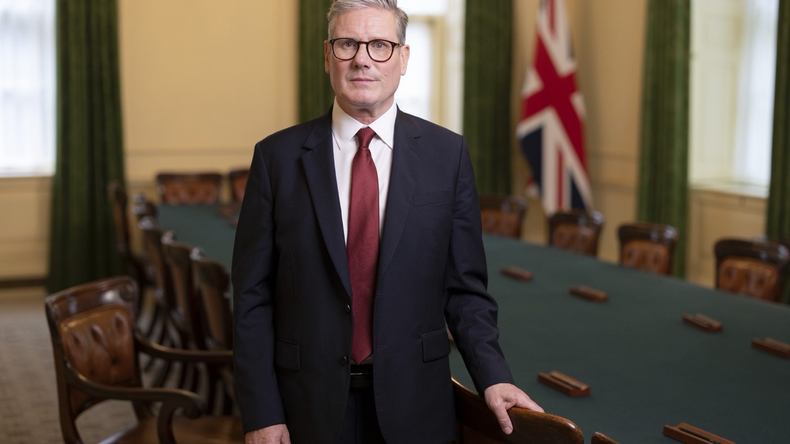 Prime Minister Keir Starmer stands in an official No 10 Downing Street portrait.