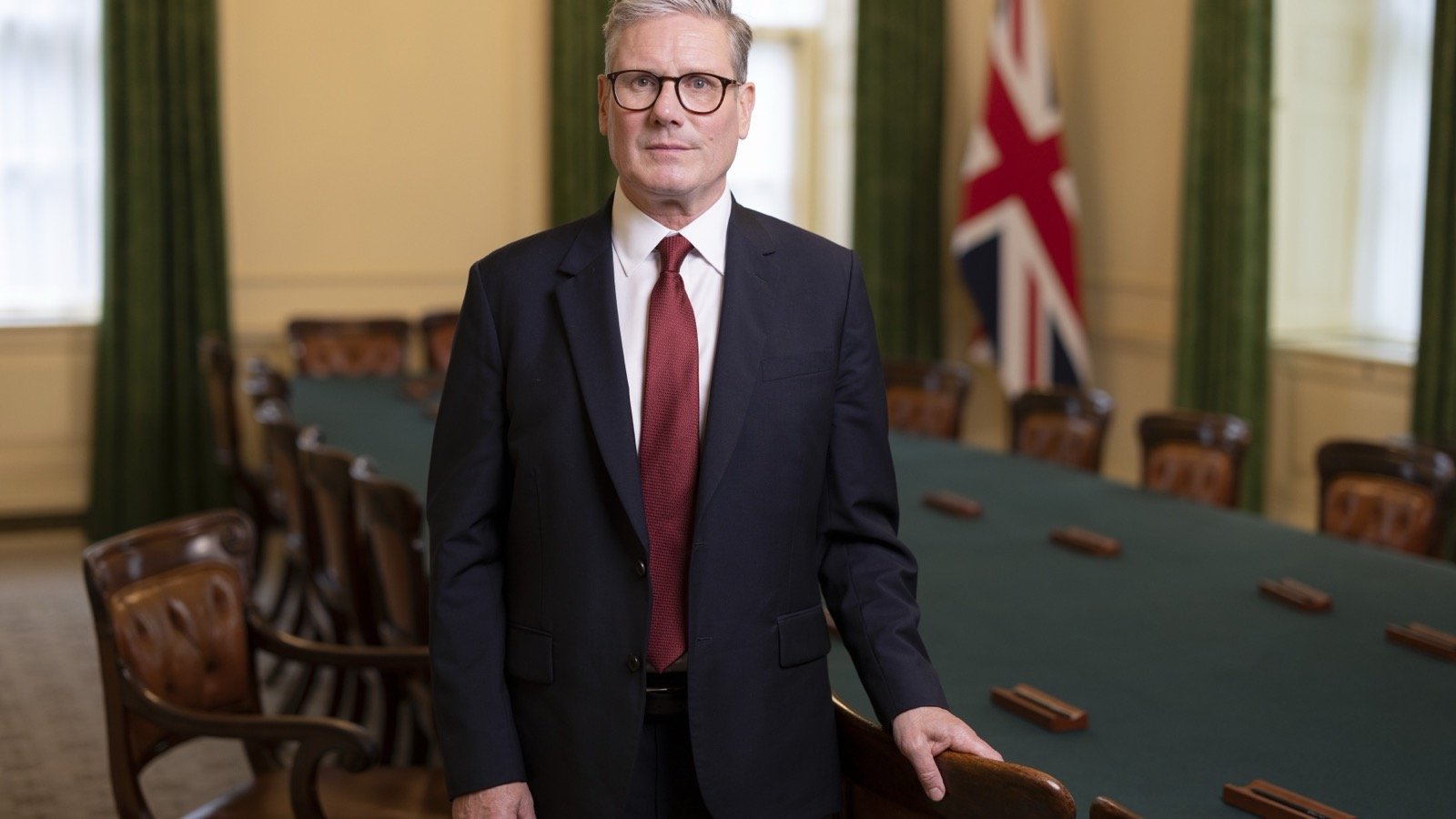 Prime Minister Keir Starmer stands in an official No 10 Downing Street portrait.
