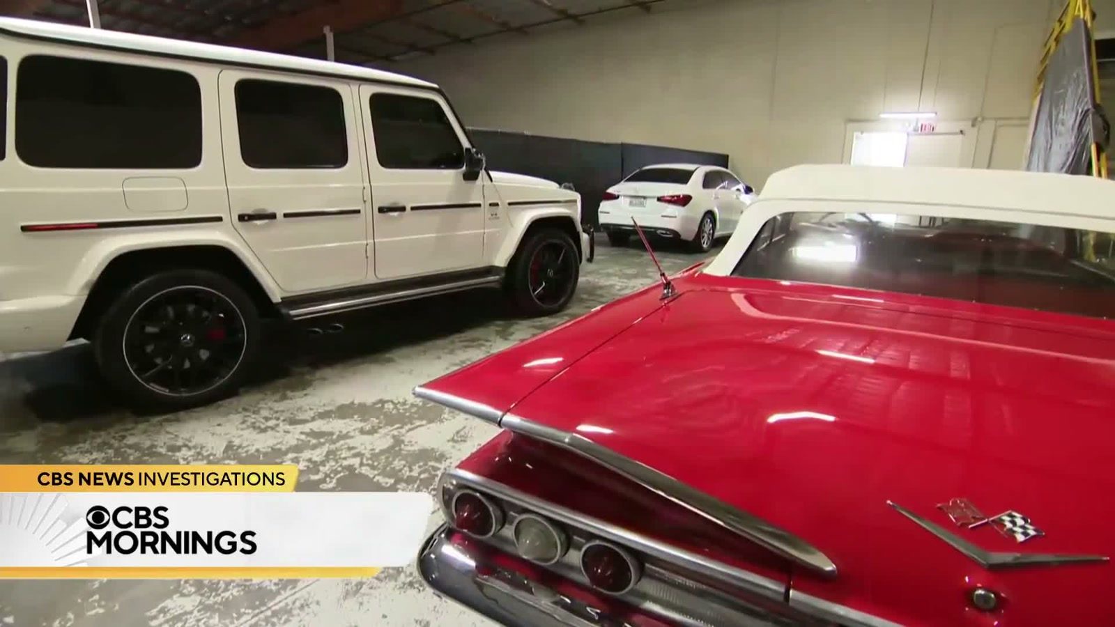 CBS News video still showing luxury vehicles tied to the Paul Randall Medi-Cal fraud investigation