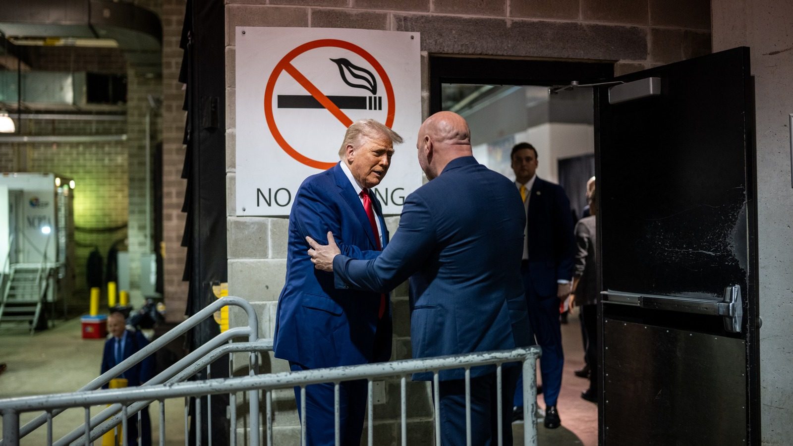 President Trump greets Dana White backstage at UFC 316