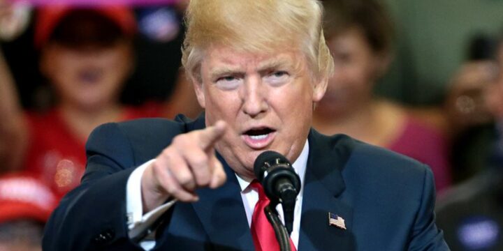 President Trump points while speaking at a campaign rally