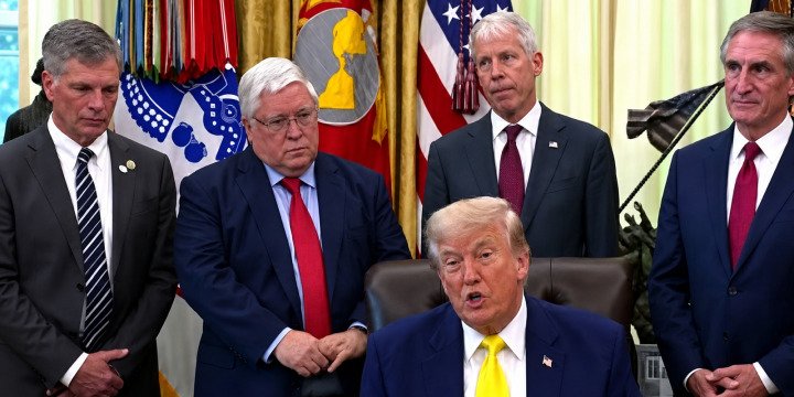 Source video still of President Trump speaking in the Oval Office with officials behind him