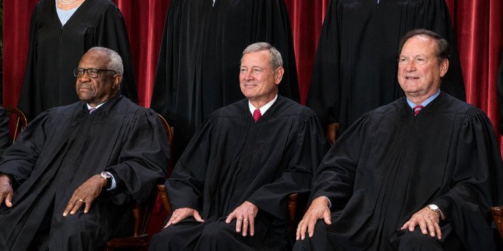 Official public domain Supreme Court justices photograph showing Justices Clarence Thomas, John Roberts, and Samuel Alito.