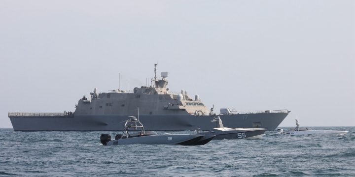 USS Indianapolis sails with Task Force 59 unmanned surface vessels in the Arabian Gulf