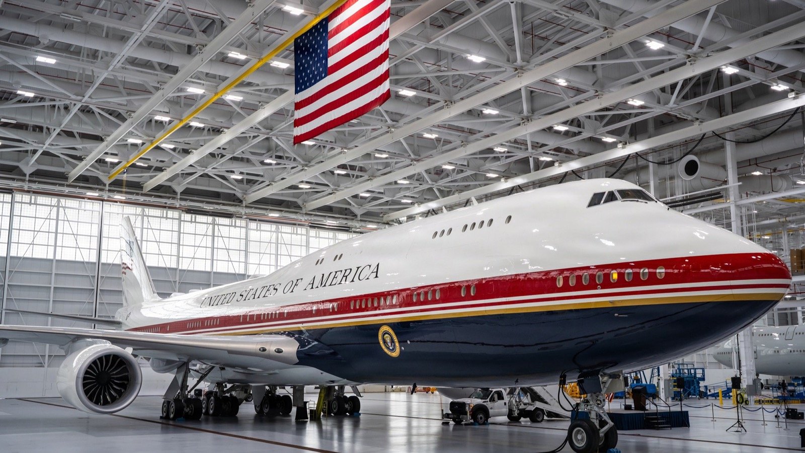 VC-25B Bridge aircraft with red, white, and blue livery inside a hangar at Joint Base Andrews