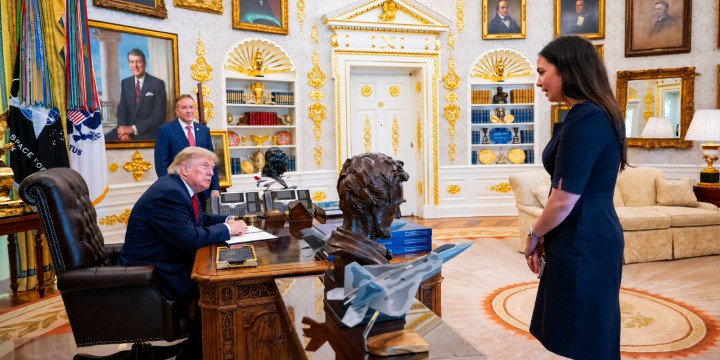 White House Deputy Press Secretary Abigail Jackson speaks with President Trump in the Oval Office
