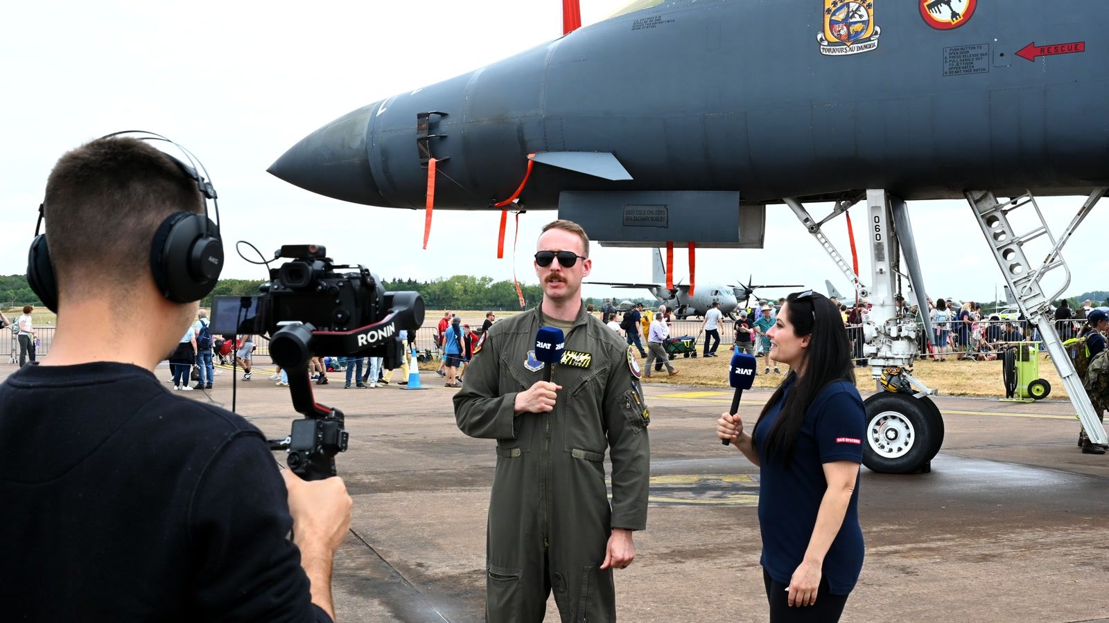 U.S. Air Force B-1B weapon systems officer interviewed beside a bomber at RAF Fairford