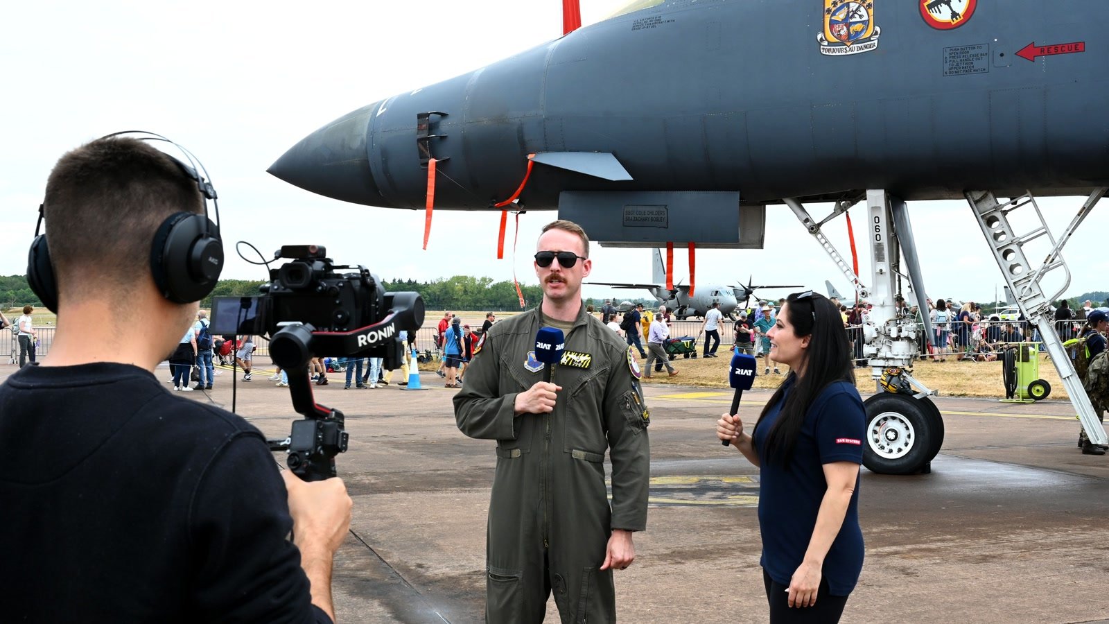 U.S. Air Force B-1B weapon systems officer interviewed beside a bomber at RAF Fairford