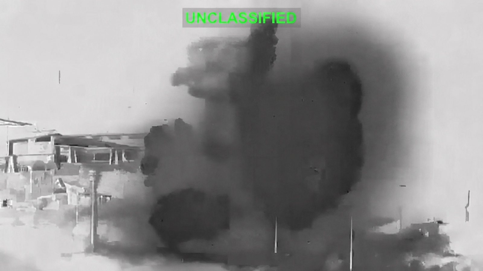 Official video still from U.S. Central Command shows the IRGC surveillance tower at Chah Bahar engulfed by a U.S. strike