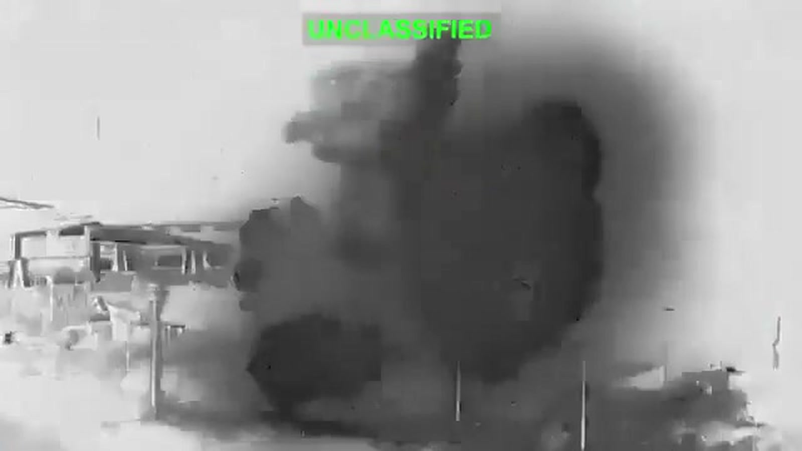 Official video still from U.S. Central Command shows the IRGC surveillance tower at Chah Bahar engulfed by a U.S. strike