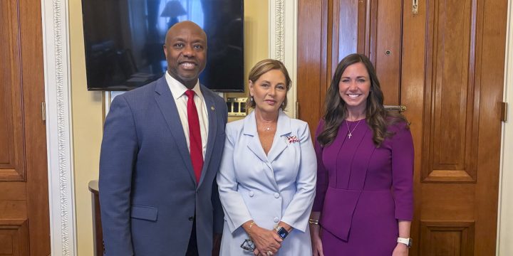 Sen. Darline Graham stands between Sens. Tim Scott and Katie Britt at the U.S. Capitol