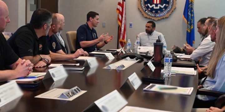 FBI Director Kash Patel meets with FBI personnel during a briefing