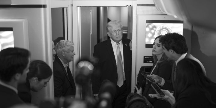 President Trump and Senator Lindsey Graham speak with reporters aboard Air Force One