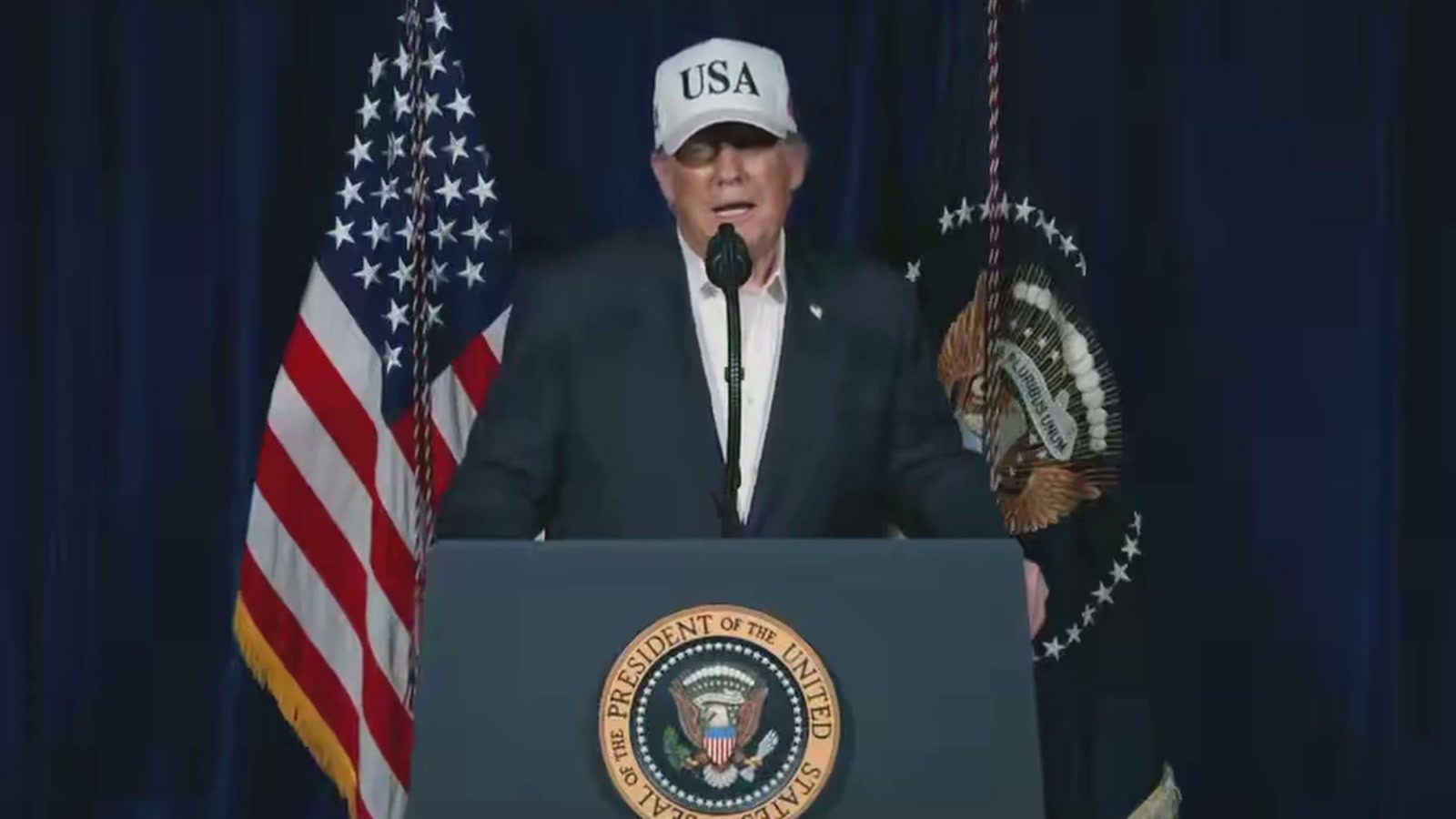 President Trump speaks at the presidential podium during remarks on Operation Epic Fury