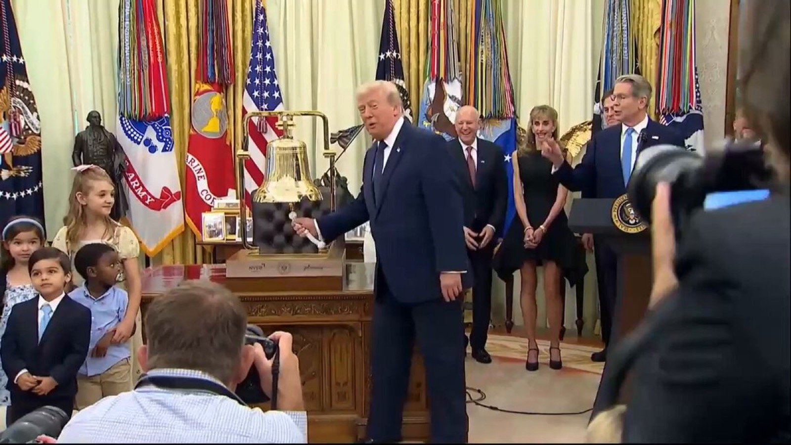 President Trump rings the stock market opening bell in the Oval Office