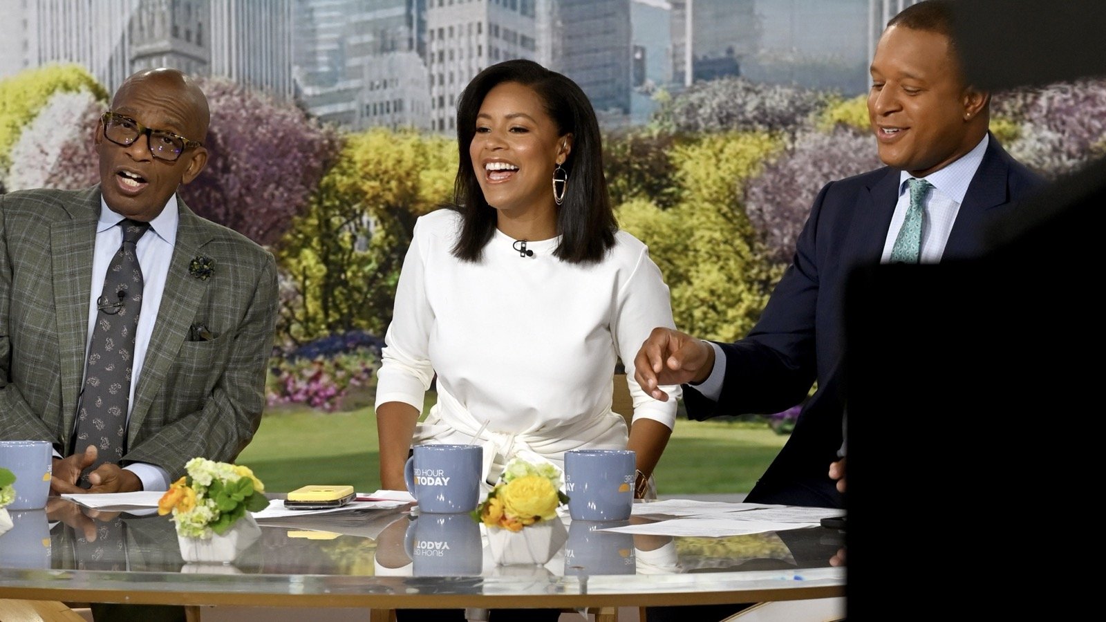 Al Roker, Sheinelle Jones and Craig Melvin seated at the TODAY desk