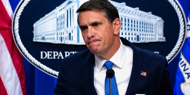 Acting Attorney General Todd Blanche speaks at the Justice Department podium