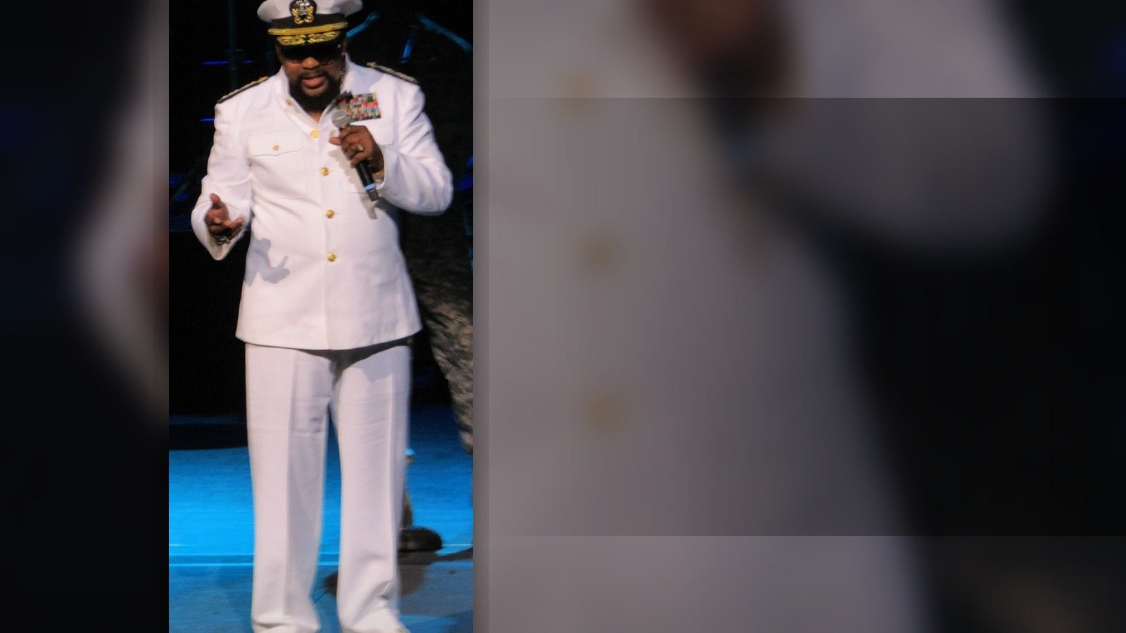 Victor Willis of Village People performing in a naval officer costume onstage