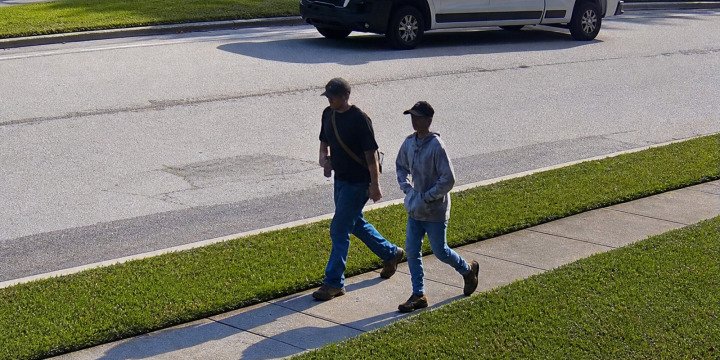 Dustin Rose and Samson Campbell walking together in DeLand, Florida