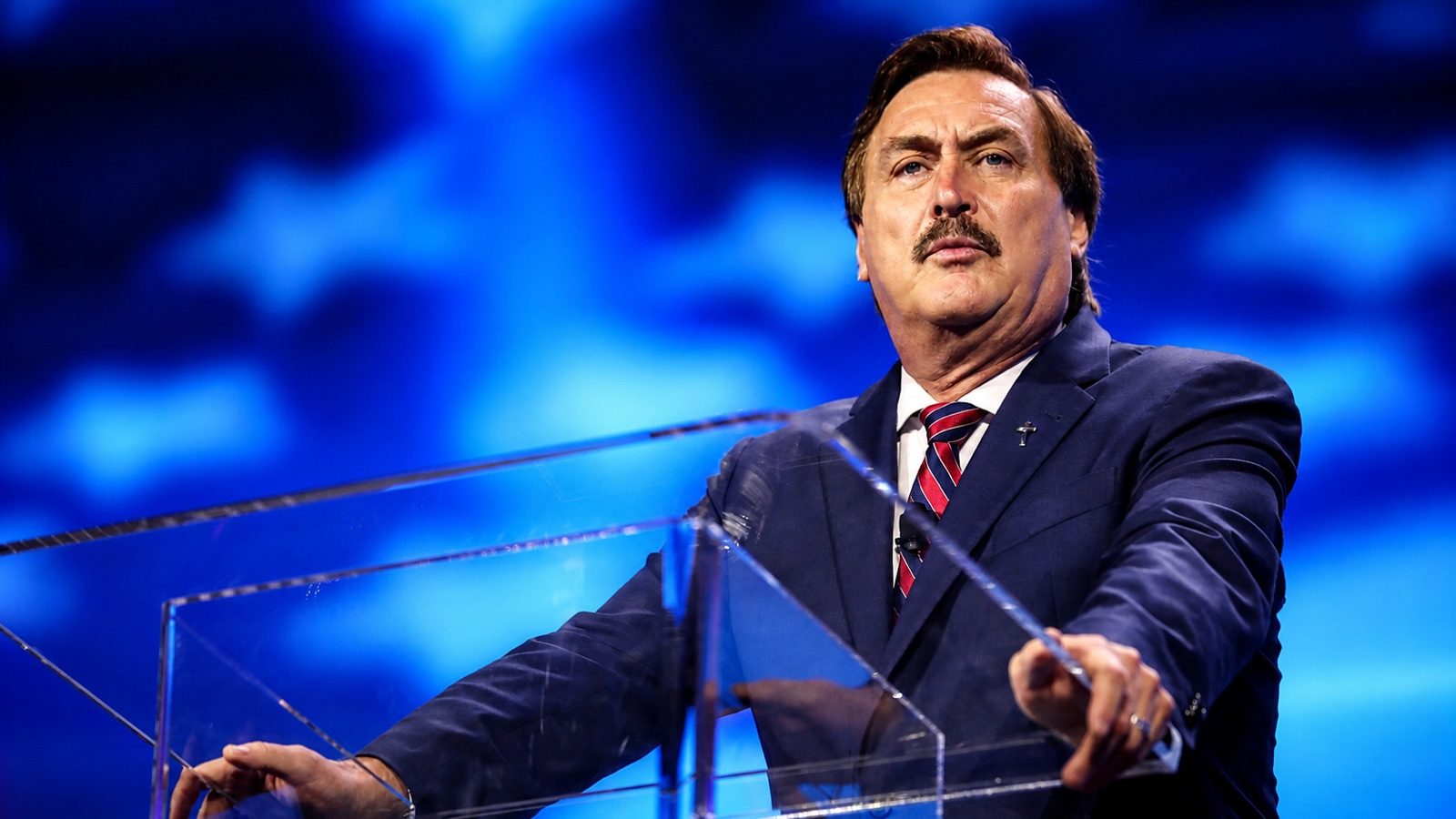 Mike Lindell speaking at a lectern