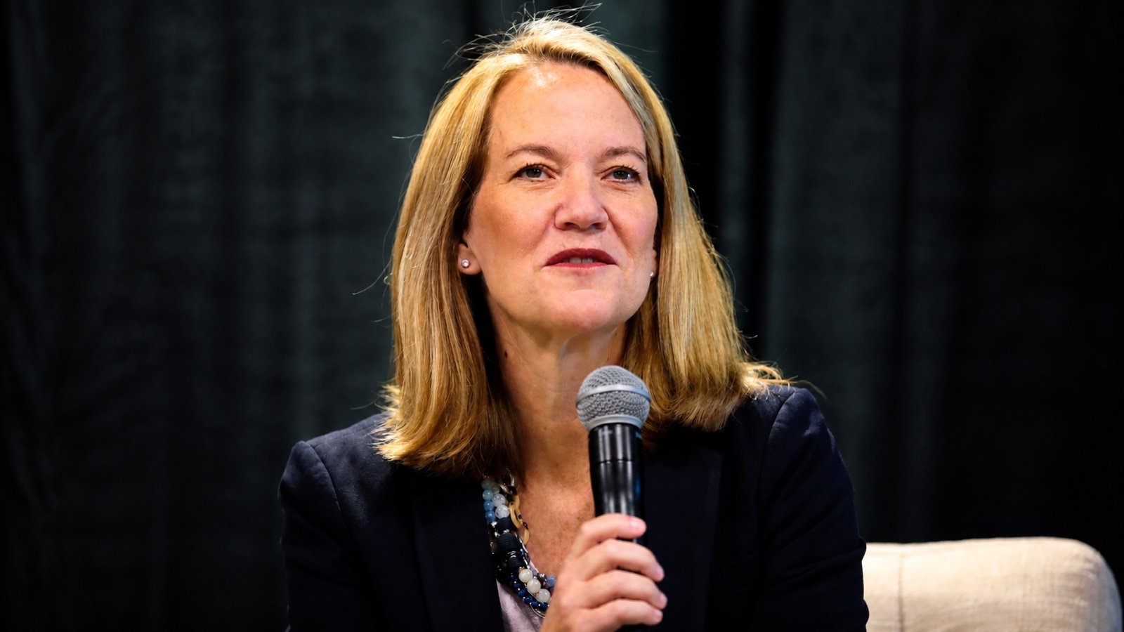 Arizona Attorney General Kris Mayes speaking at an Arizona candidate forum