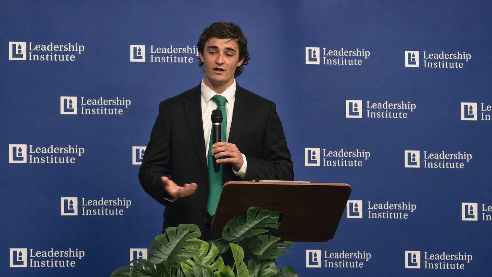 Independent journalist Nick Shirley speaking at an April 2026 event