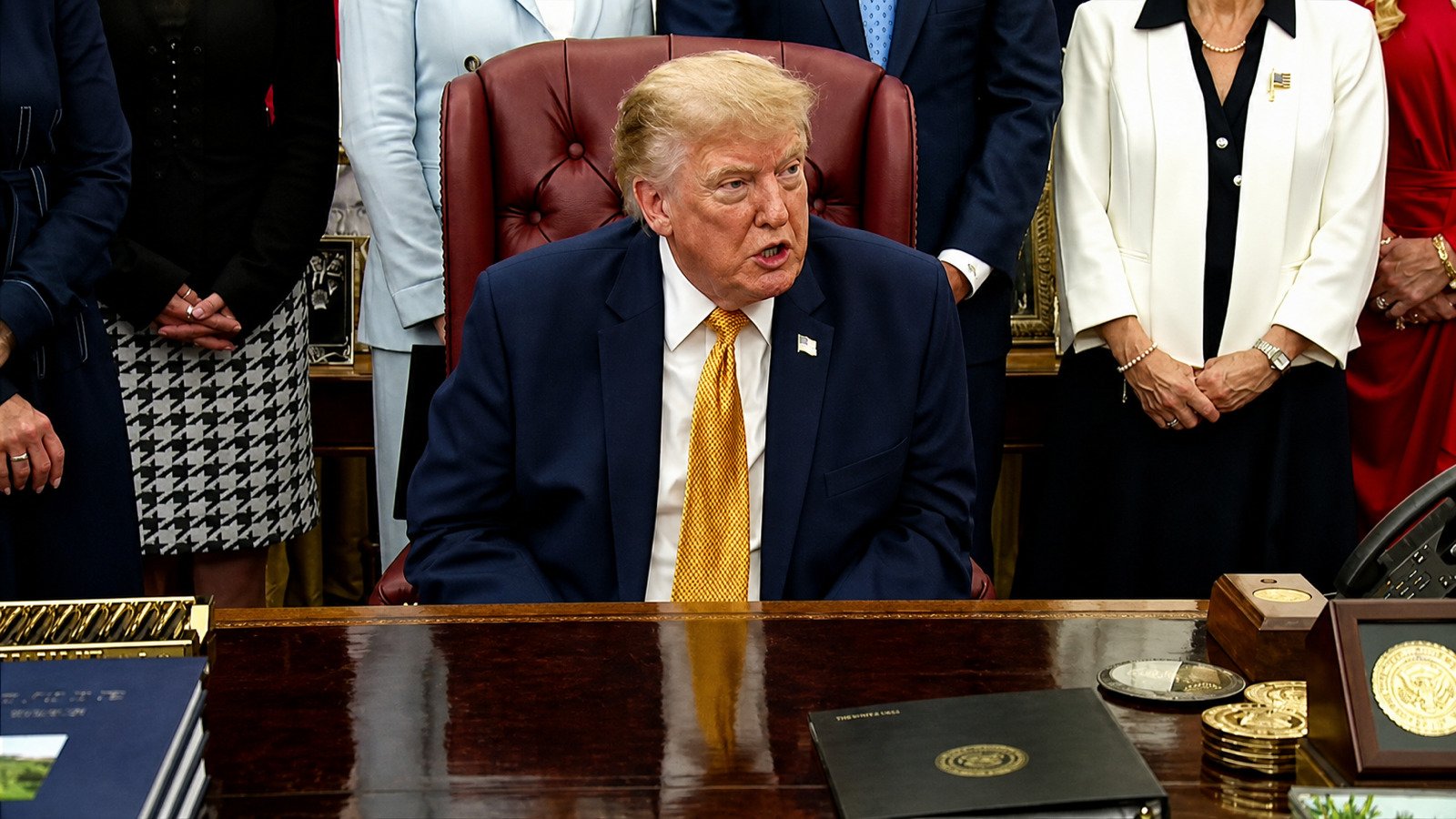 President Trump answering reporters from the Resolute Desk in the Oval Office on August 3, 2026