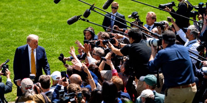 President Trump speaks with reporters on the White House South Lawn
