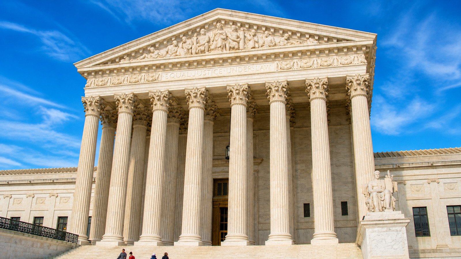 The United States Supreme Court building beneath a blue sky