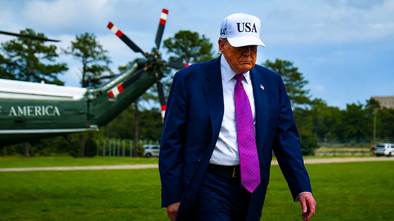 President Trump walks in front of Marine One