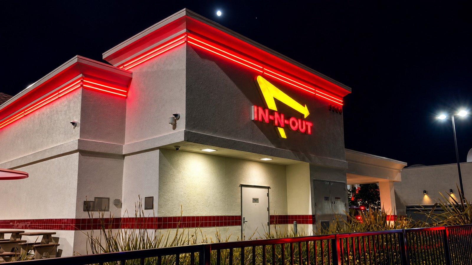 An In-N-Out Burger restaurant exterior at night